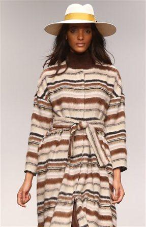 British model Jourdan Dunn shows a creation by designer Issa during London Fashion Week, at Somerset House in central London, Saturday, Feb. 16, 2013. (Photo by Joel Ryan/Invision/AP)